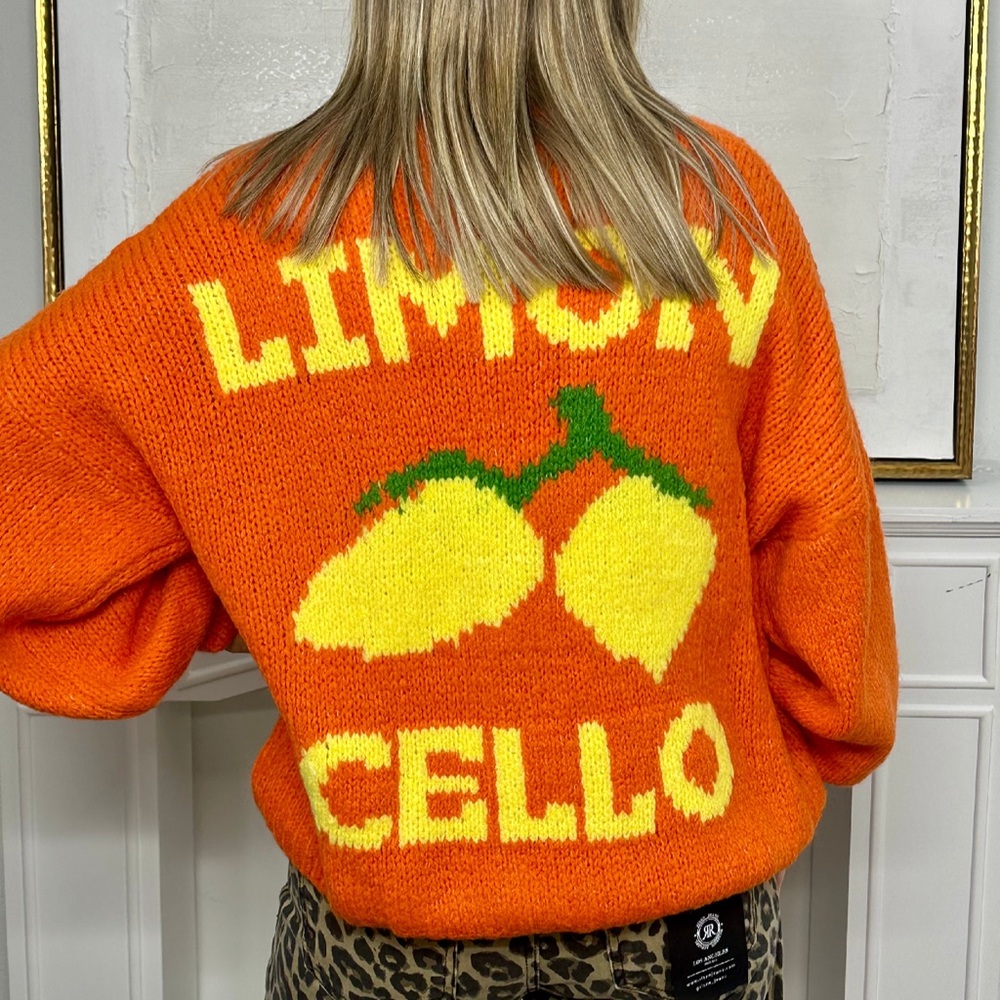 New with tags. Limon Cello cardigan orange. Hand made in Italy.